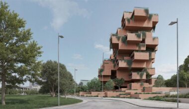 stacked earthen red volumes shape rhythmic residential tower in athens