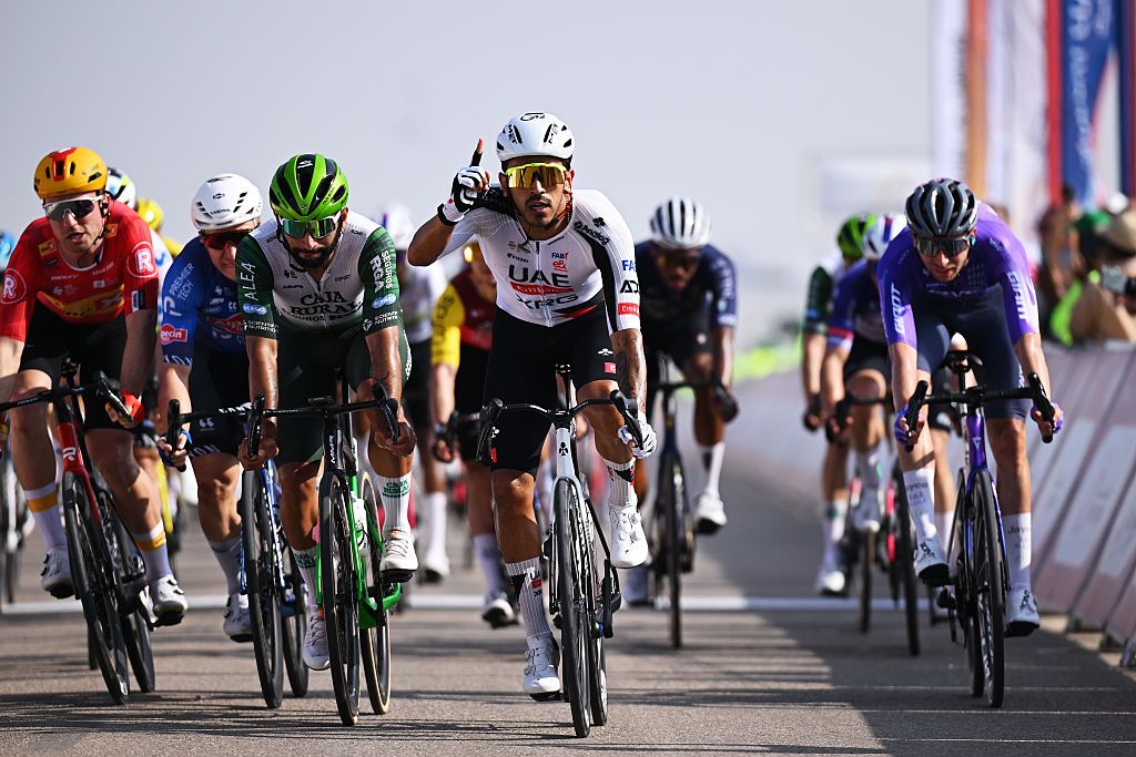 BIMMAH SINKHOLE, OMAN - FEBRUARY 07: Juan Sebastian Molano of Colombia and UAE Team Emirates celebrates at finish line as stage winner ahead of Fernando Gaviria of Colombia and Team Caja Rural-Seguros RGA and Gerben Thijssen of Belgium and Team Alpecin-Premier Tech during the 15th Tour of Oman 2026, Stage 1 a 170.9km stage from Ministry of Tourism to Bimmah Sink Hole on February 07, 2026 in Bimmah sinkhole, Oman. (Photo by Dario Belingheri/Getty Images)