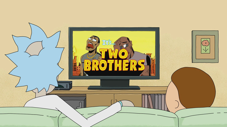 Rick and Morty sitting on the couch, watching the trailer for Two Brothers on interdimensional cable.