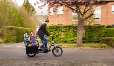 parents and children on e-bikes