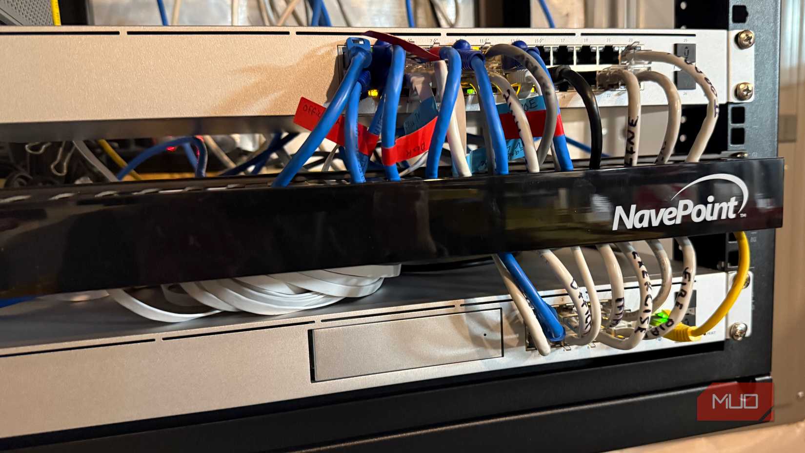 Serveral ethernet cables routed through organizer