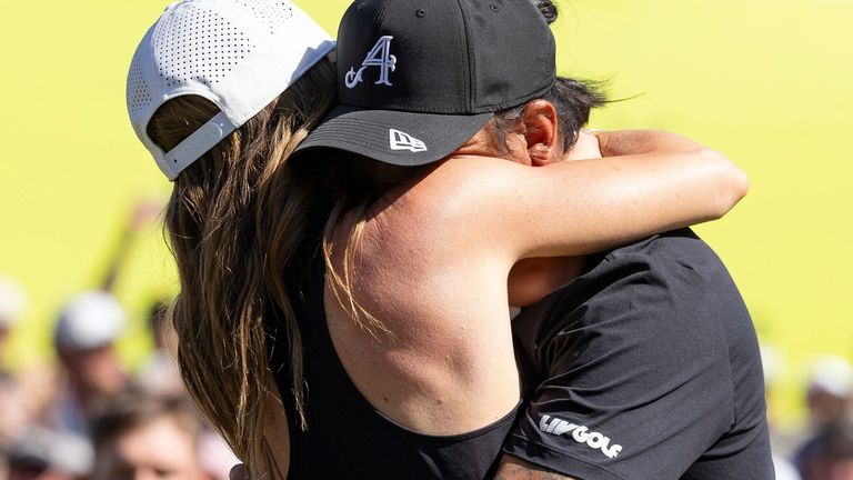 Kim celebrates with family (Photo by Jon Ferrey/LIV Golf via AP)