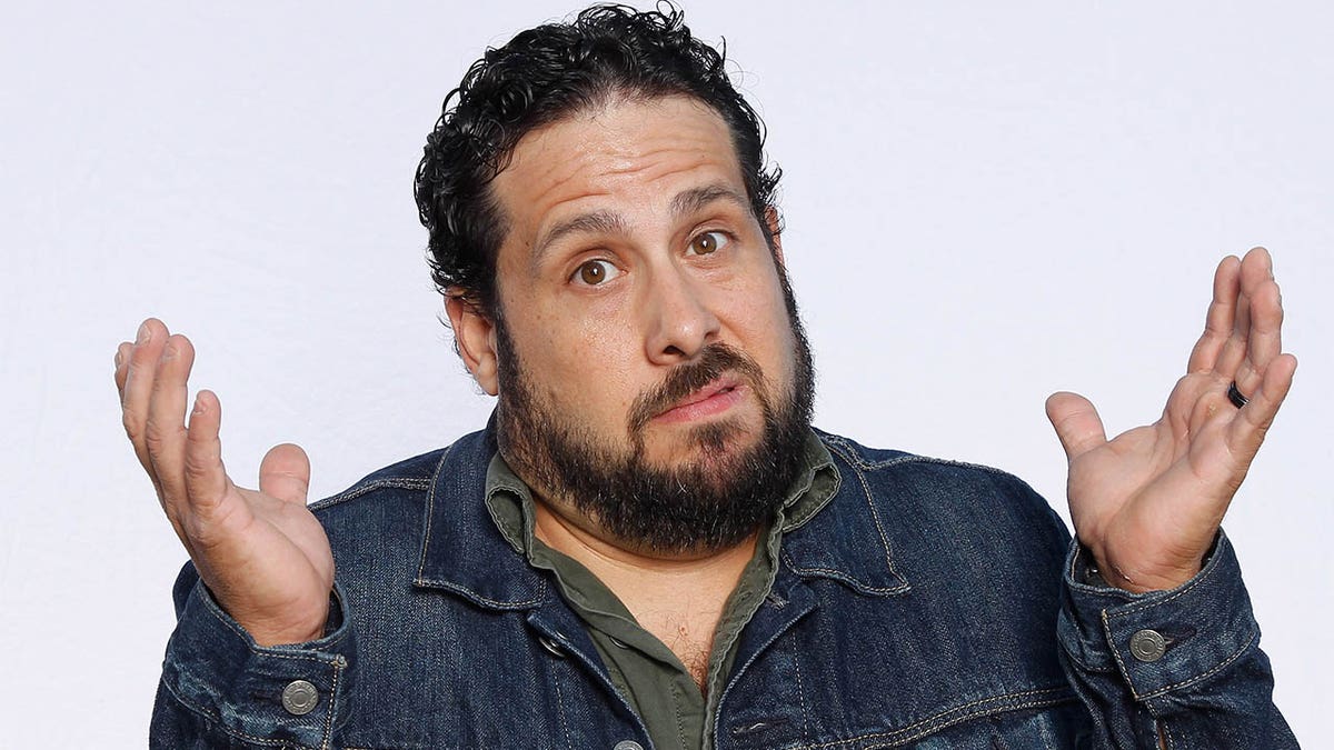 Steve Trevino with his hands up 