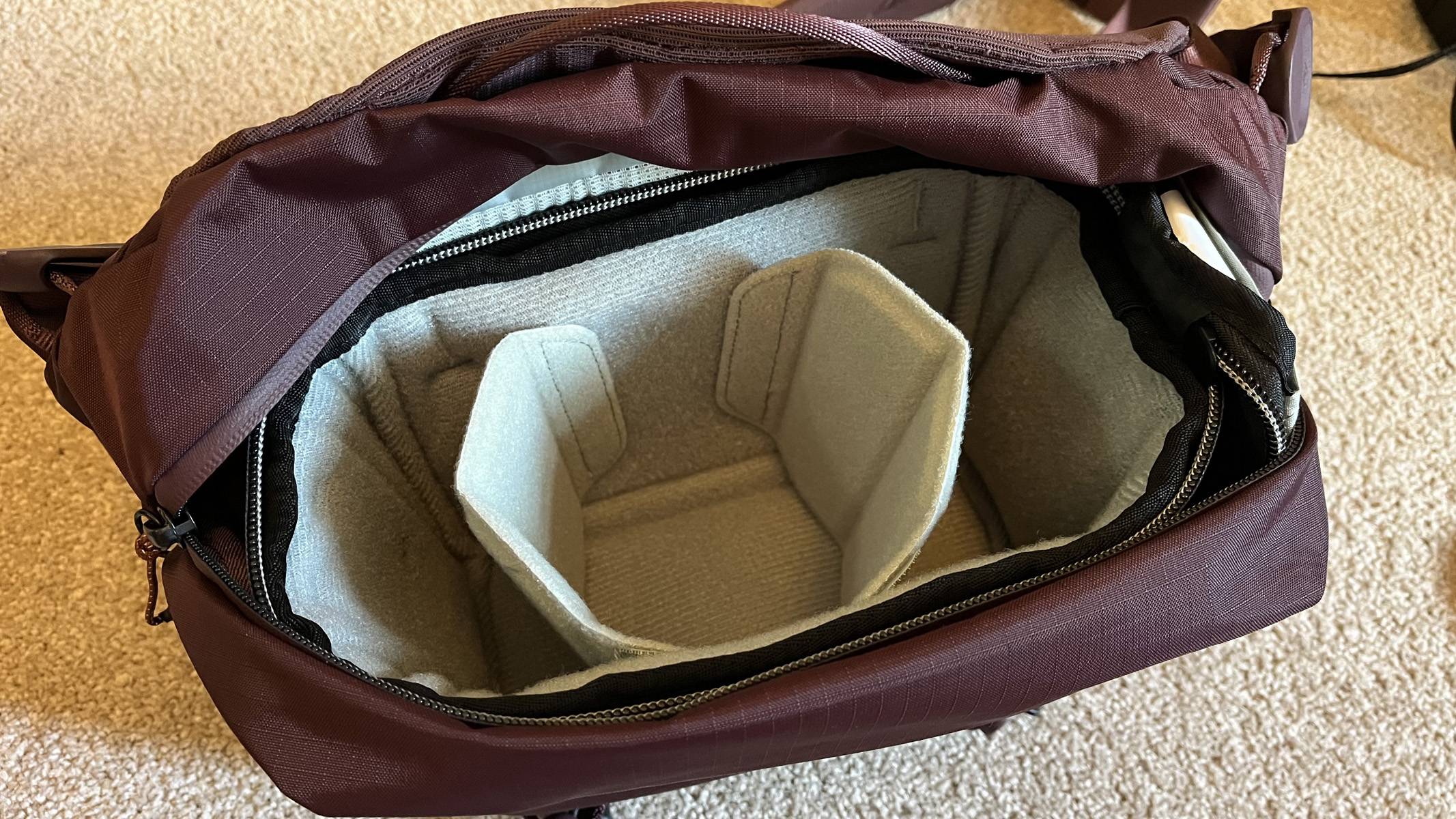 The PD sling bag 7L, open and empty.
