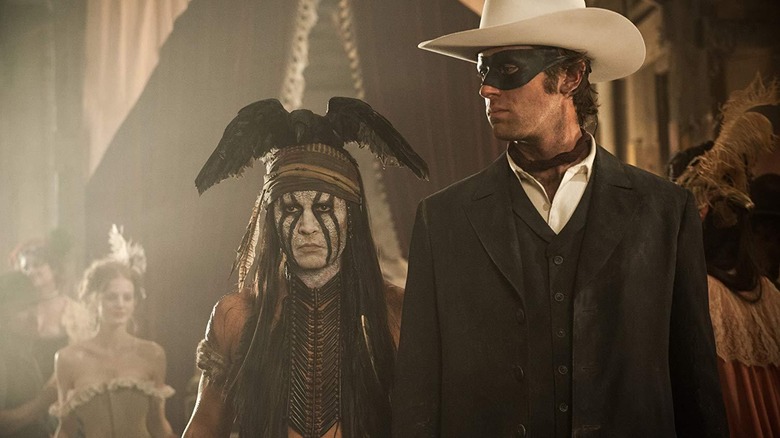 Johnny Dep as Tonto and Armie Hammer as John, sizing up threats in The Lone Ranger