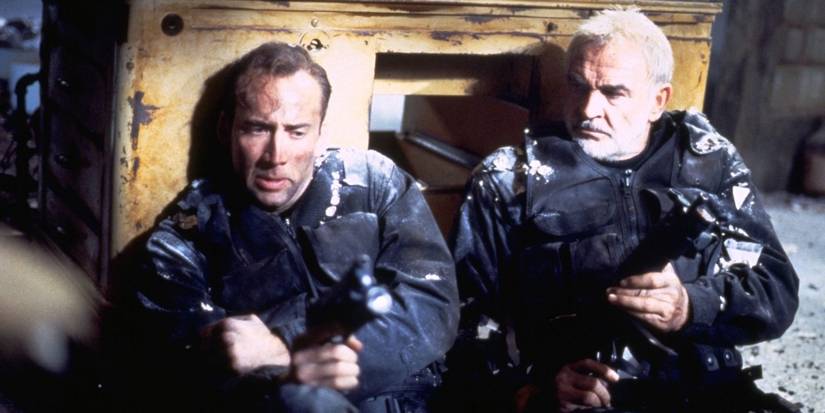 Sean Connery and Nicolas Cage ducking gunfire in The Rock