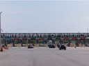 Vehicles in line to cross into the United States at the Canada-U.S. border in St-Bernard-de-Lacolle, Quebec, on July 12, 2025.  