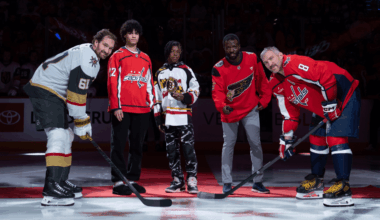 Woodard, Abercrombie drop puck at Capitals Black History celebration