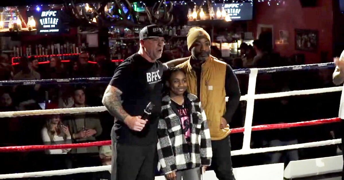 Young boxer receives scholarship at River City Fight Night charity event