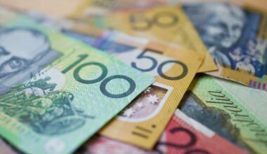 Australian banknotes laid out on a table.
