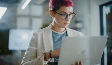 A person at a laptop.