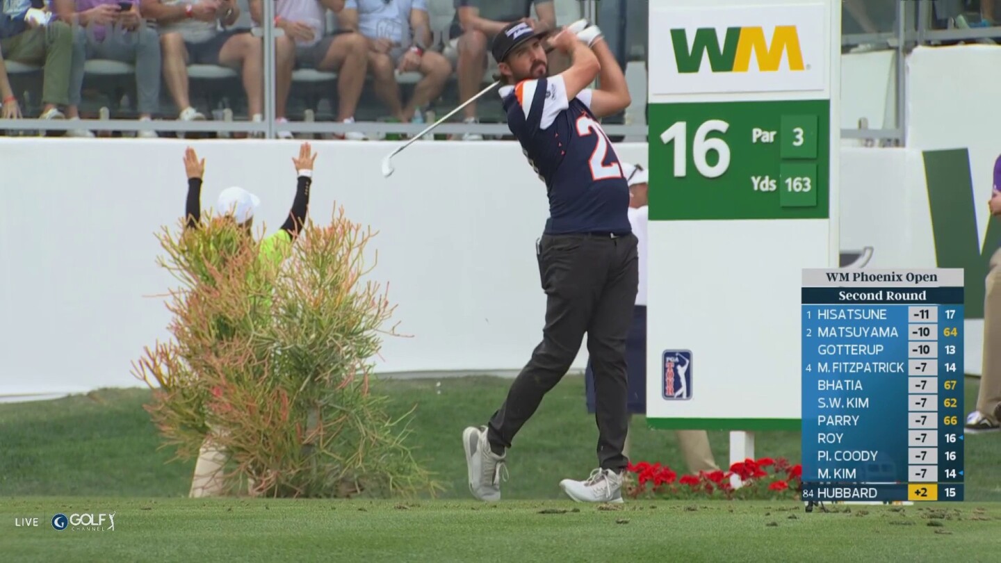 Mark Hubbard drills tee shot on 16 wearing Broncos jersey