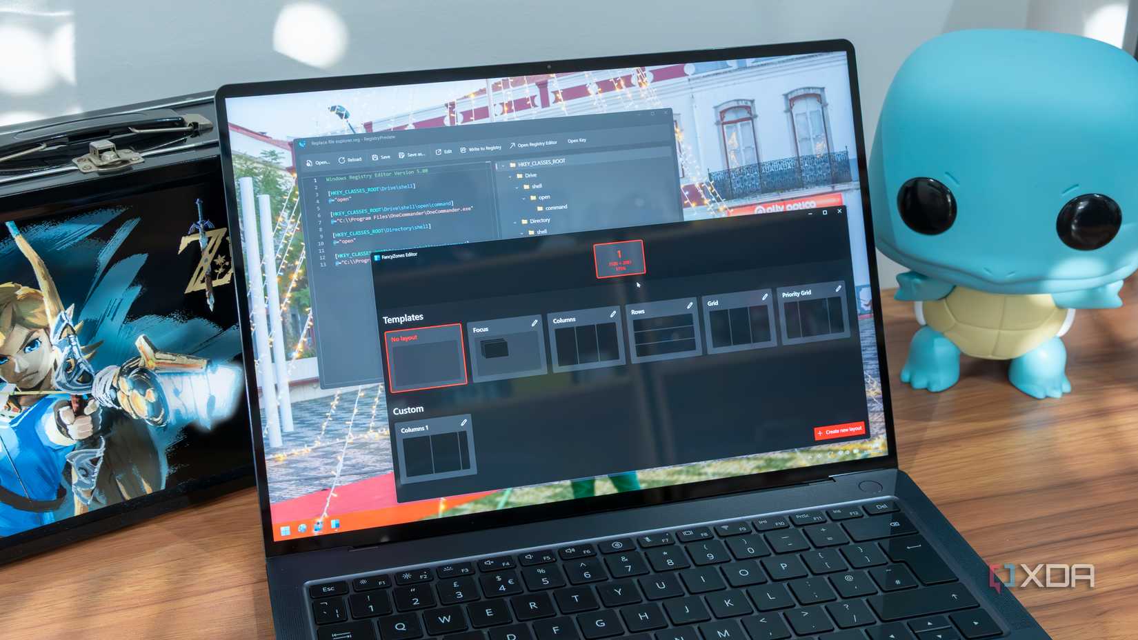 A Windows 11 laptop showing Registry preview and FancyZones settings