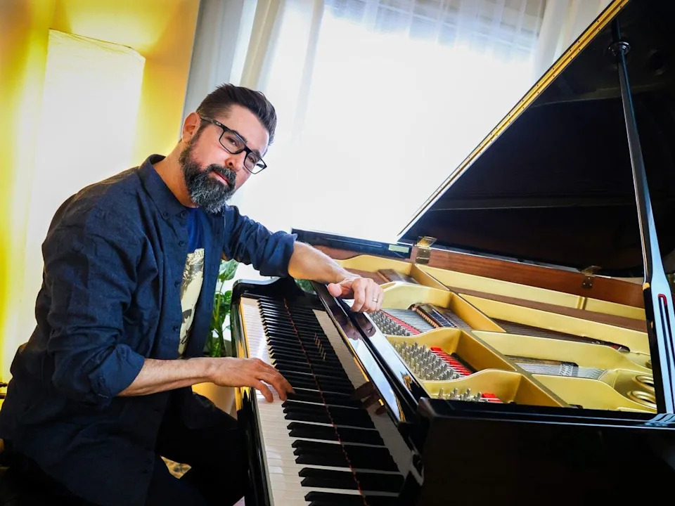  Jazz pianist Chris Tauchner was photographed at his Calgary home on Wednesday, March 4, 2026. Photo by Gavin Young/Postmedia