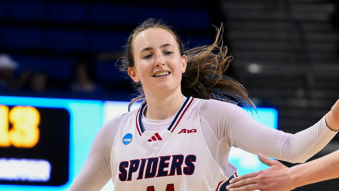 Mar 21, 2025; Los Angeles, California, USA; Richmond Spiders forward Maggie Doogan (44) celebrates with forward Addie Budnik (20) after scoring a basket during the first quarter of an NCAA Tournament first-round game at Pauley Pavilion presented by Wescom. Mandatory Credit: Robert Hanashiro-Imagn Images