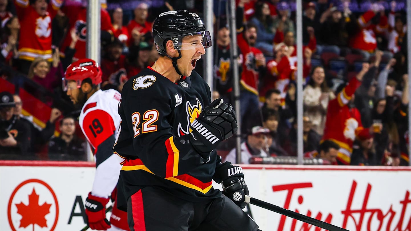 Mar 7, 2026; Calgary, Alberta, CAN; Calgary Flames center Ryan Strome (22) scores a goal against the Carolina Hurricanes during the second period at Scotiabank Saddledome. Mandatory Credit: Sergei Belski-Imagn Images