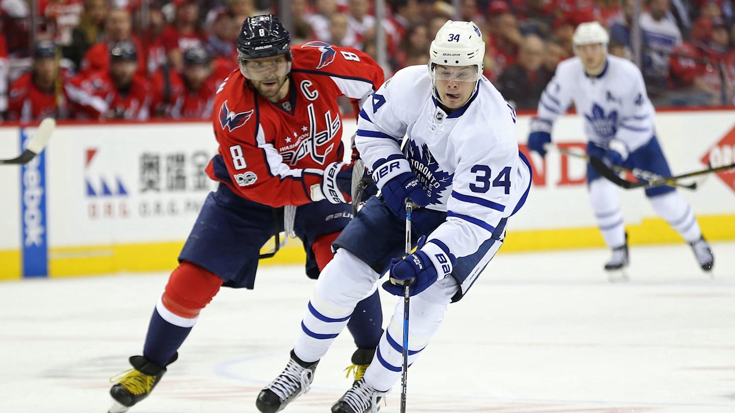 Apr 13, 2017; Washington, DC, USA; Toronto Maple Leafs center Auston Matthews (34) skates with the puck as Washington Capitals left wing Alex Ovechkin (8) defends in the second period in game one of the first round of the 2017 Stanley Cup Playoffs at Verizon Center. Mandatory Credit: Geoff Burke-Imagn Images