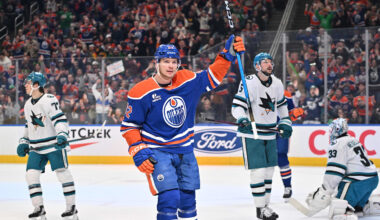 Mar 17, 2026; Edmonton, Alberta, CAN; Edmonton Oilers right winger Vasily Podkolzin (92) celebrates a goal on San Jose Sharks goalie Alex Nedeljkovic (33) during the first period at Rogers Place. Mandatory Credit: Walter Tychnowicz-Imagn Images
