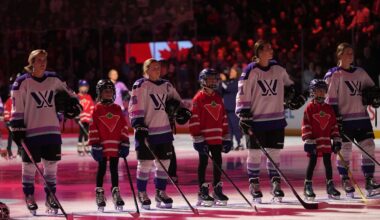 Feb 1, 2024; Toronto, Ontario, CANADA; Members of Team King and minor league players during the anthem before the PWHL 3-on-3 Showcase during NHL All-Star Thursday at Scotiabank Arena. Mandatory Credit: John E. Sokolowski-Imagn Images