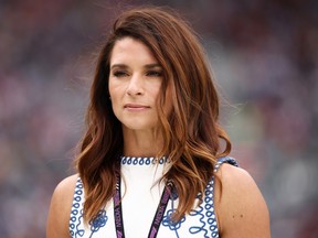 Danica Patrick looks on from the drivers parade prior to the F1 Grand Prix of Mexico at Autodromo Hermanos Rodriguez in 2024.