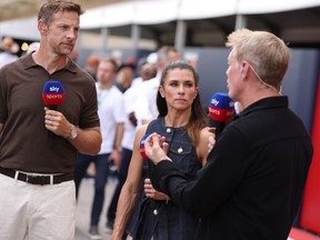 Jenson Button, Danica Patrick and Simon Lazenby of Sky Sports F1 prior to Qualifying ahead of last year's F1 Grand Prix of United States.