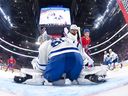 Joseph Woll of the Toronto Maple Leafs lets in a goal by Oliver Kapanen of the Montréal Canadiens during Tuesday's game.