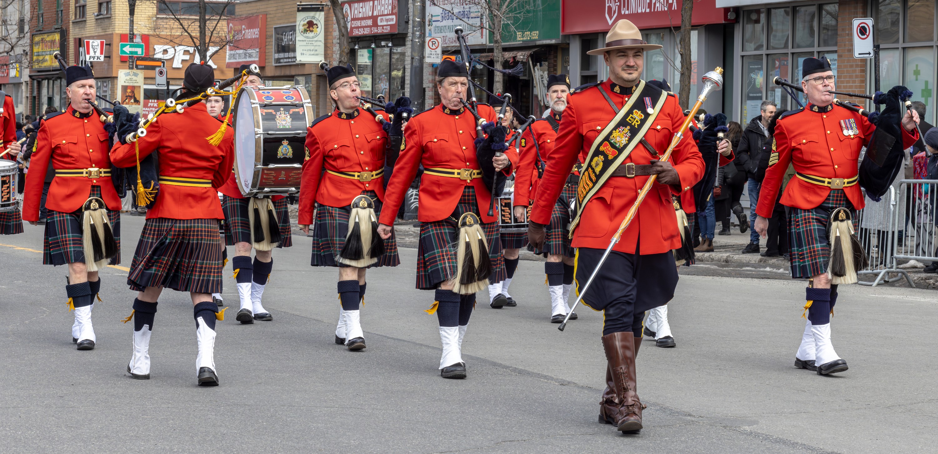 A marching band takes part in a parade.