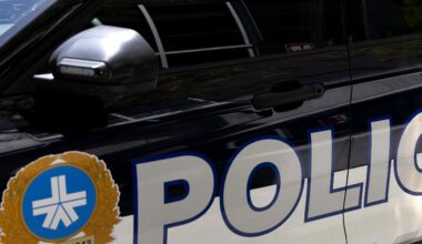 The side of a Montreal police car.