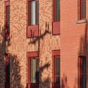 © Ulysse Lemerise Place Tenaquip - Affordable Housing Units / L. McComber - Interior Photography, Brick, Facade