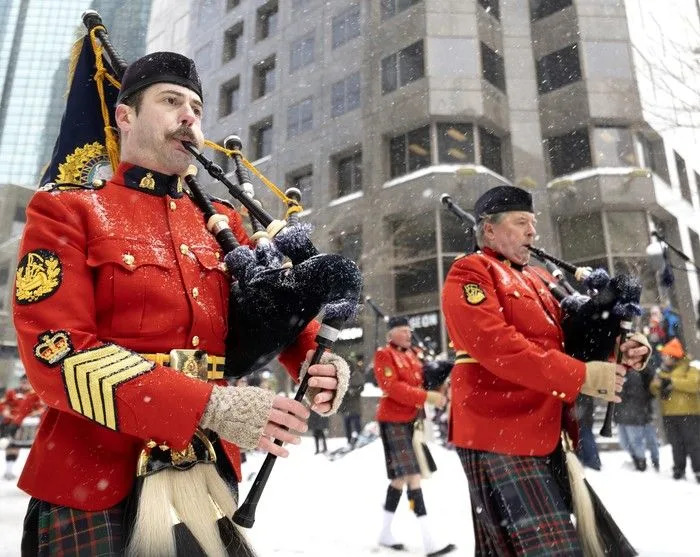  The RCMP Pipes and Drums take part in the St. Patrick’s Parade in Montreal on Sunday, March 22, 2026.