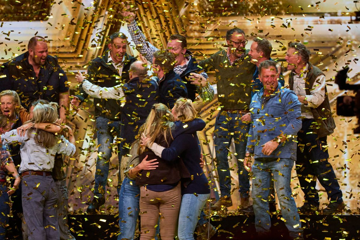 The choir celebrating on stage 