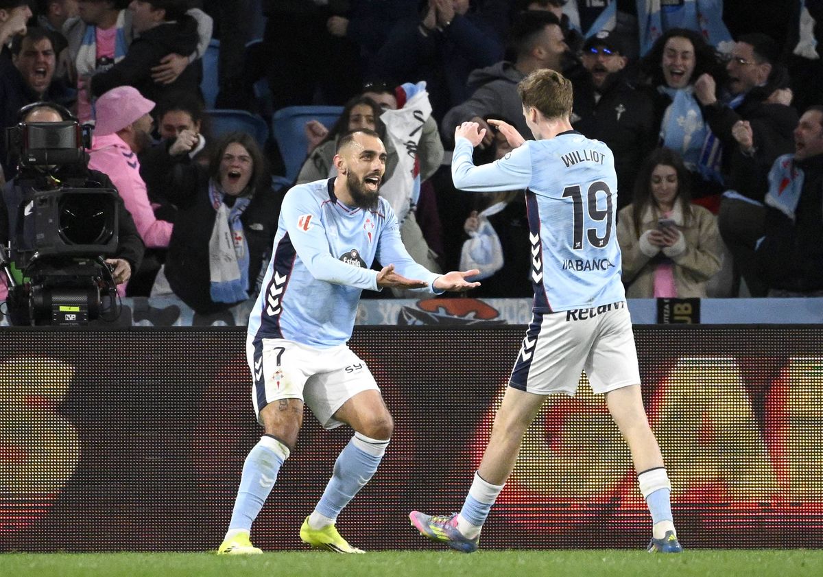 Celta Vigo's Spanish forward #07 Borja Iglesias celebrates with Celta Vigo's Swedish forward #19 Williot Swedberg scoring his team's first goal during the Spanish league football match between Celta Vigo and Real Madrid CF at the Balaidos Stadium in Vigo on March 6, 2026. (Photo by Miguel RIOPA / AFP via Getty Images)