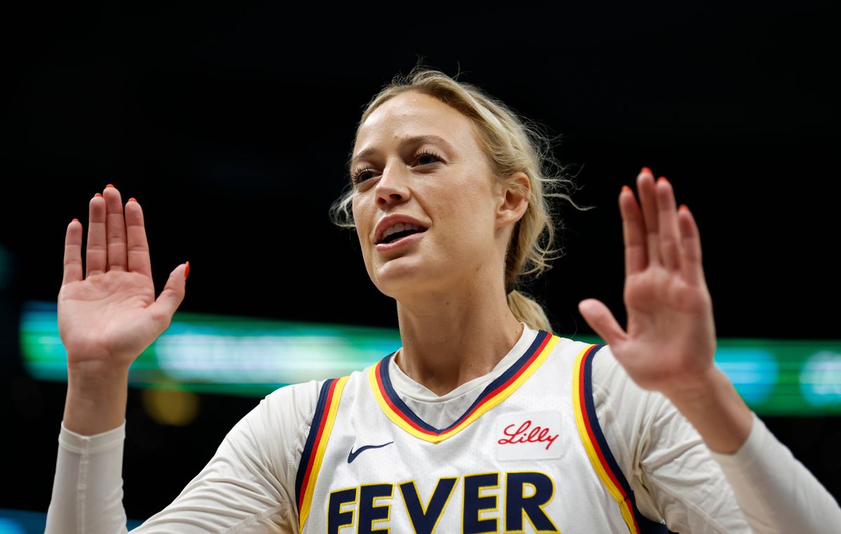 Former Indiana Fever player Sophie Cunningham puts her hands up