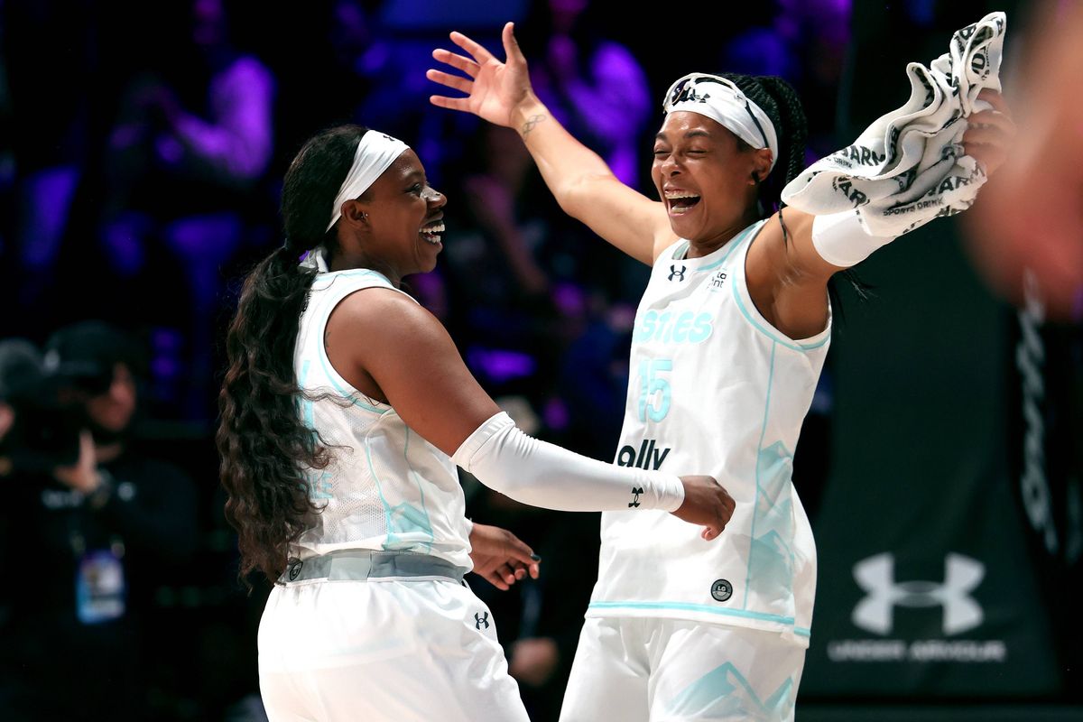 Arike Ogunbowale and Allisha Gray of the Mist celebrate Unrivaled winning shot