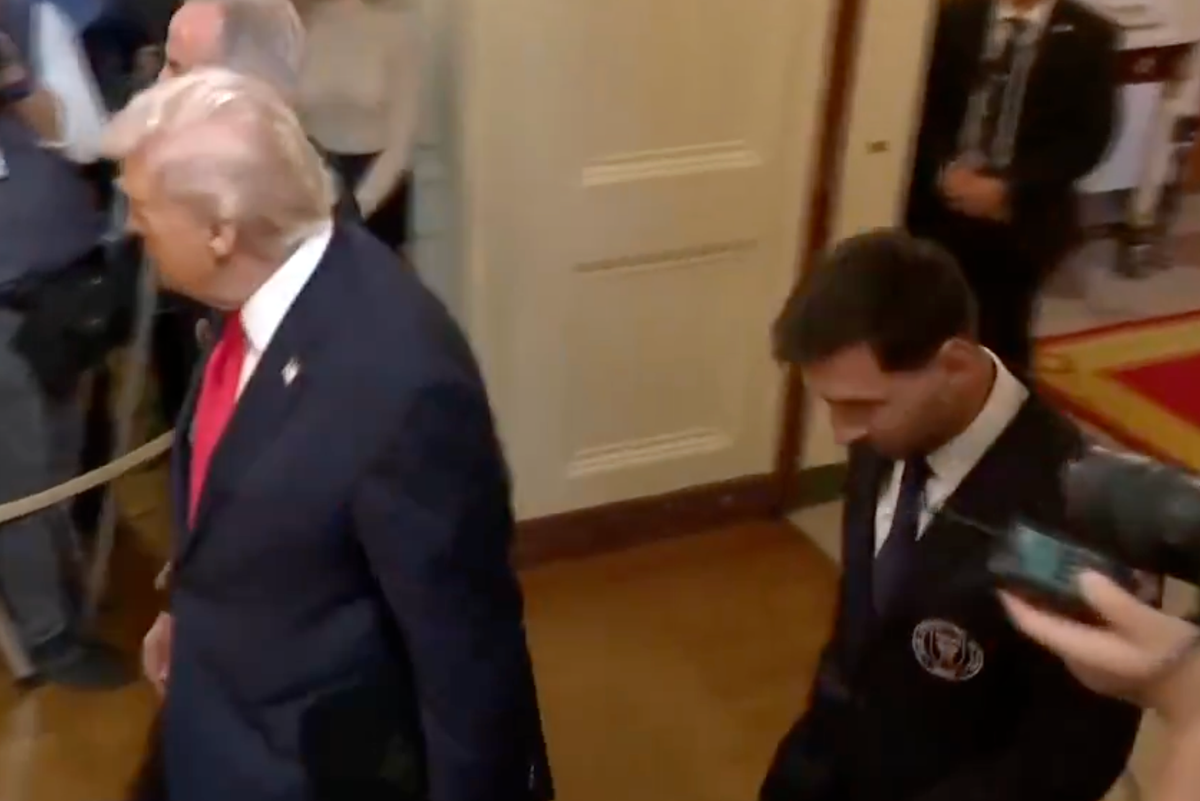 Lionel Messi had his head down when following Donald Trump at the White House