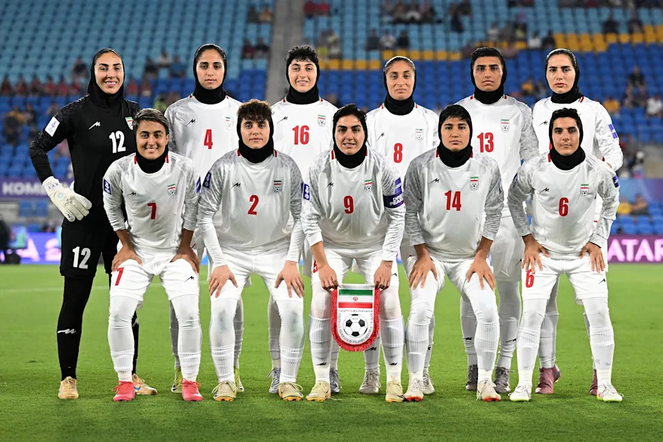 Dave Hunt/AAPImage via AP - PHOTO: Iran players pose for a team photo ahead of the Women's Asia Cup soccer match between Iran and South Korea on the Gold Coast, Australia, March 2, 2026.