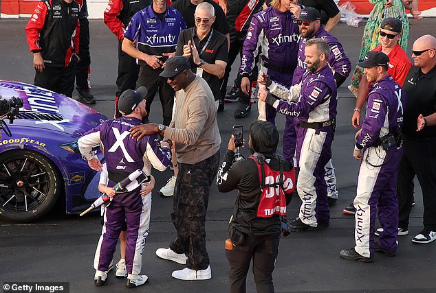 Co-owner of the 23XI Racing team, Jordan was seen sauntering across pit row at Darlington Raceway on Sunday to celebrate driver Tyler Reddick's fourth checkered flag of the year
