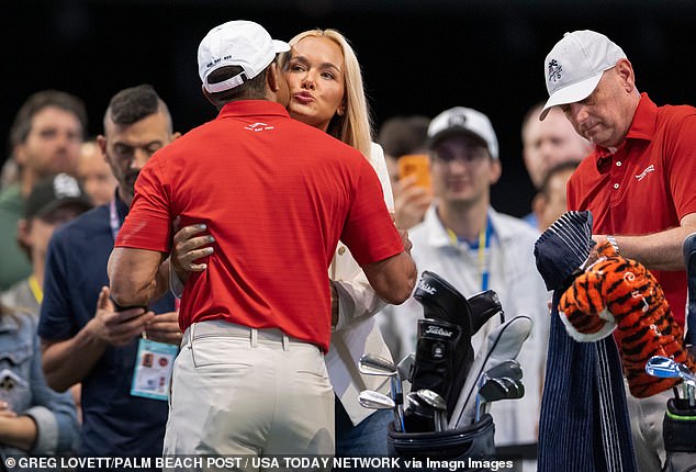 Tiger Woods of Jupiter Links GC gets a hug and kiss from Vanessa Trump before match against Los Angeles Golf Club during the TGL finals at SoFi Center earlier this week