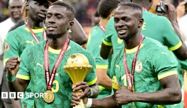 Senegal players celebrate with the Africa Cup of Nations title
