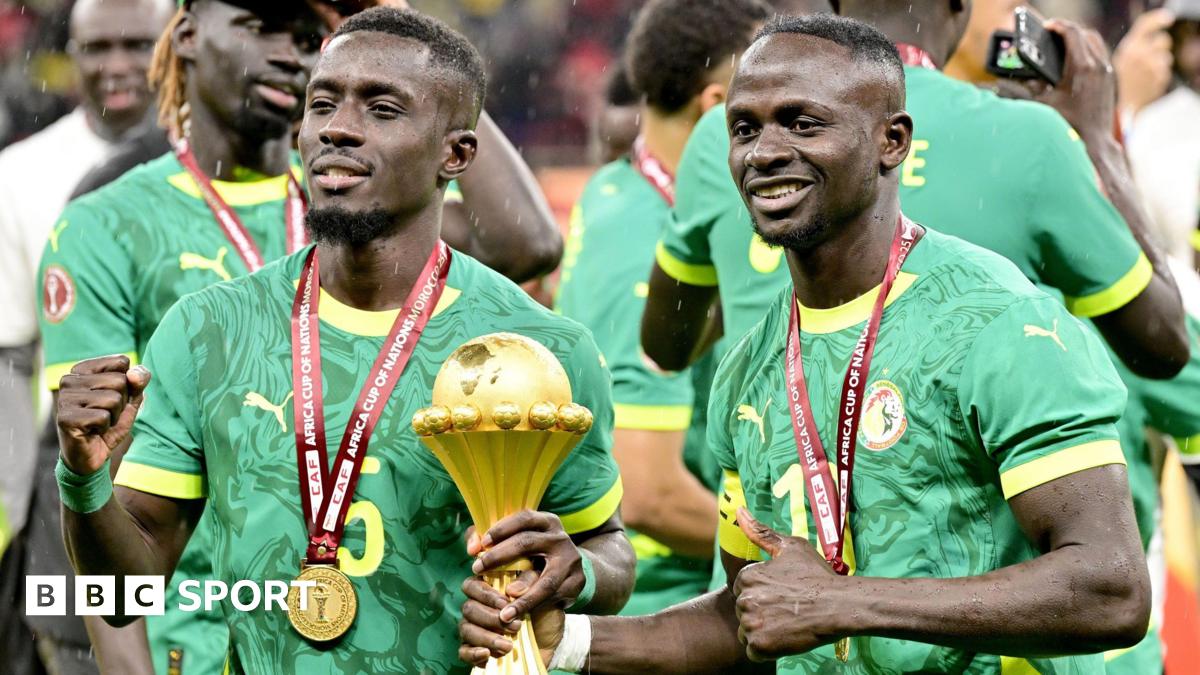 Senegal players celebrate with the Africa Cup of Nations title