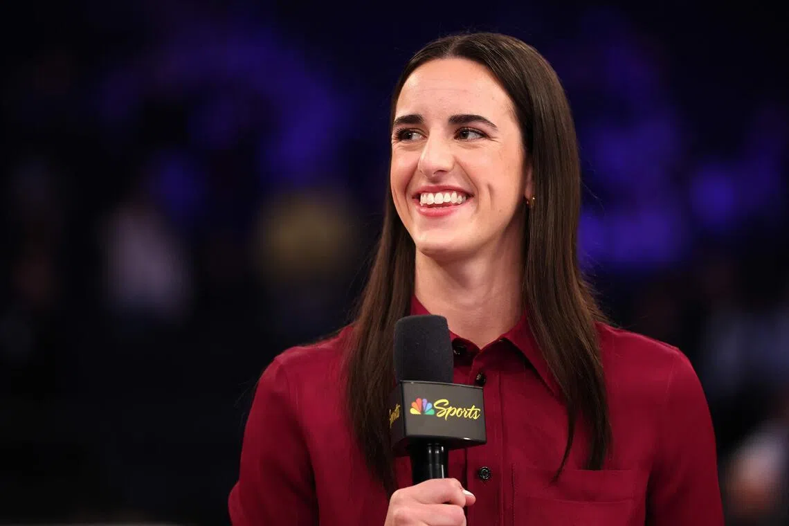 Caitlin Clark, one of the WNBA's stars, talking on stage before an NBA game between the Los Angeles Lakers and New York Knicks at Madison Square Garden on Feb 1.