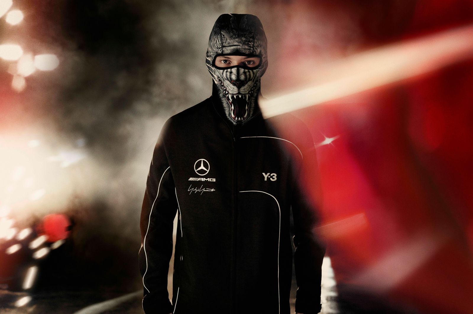 Image may contain Clothing Coat Jacket Adult Person Hoodie Knitwear Sweater Sweatshirt Hood Face and Head