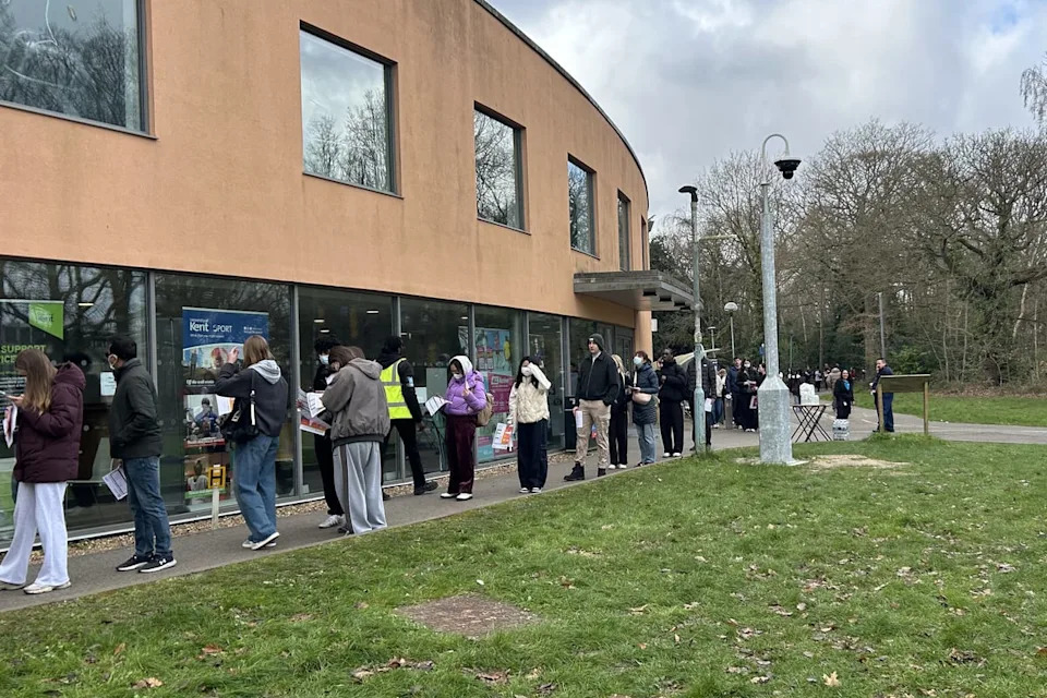 Students queuing to receive vaccines and antibiotics at the University of Kent campus in Canterbury on Saturday morning (Stanley Murphy-Johns/PA)