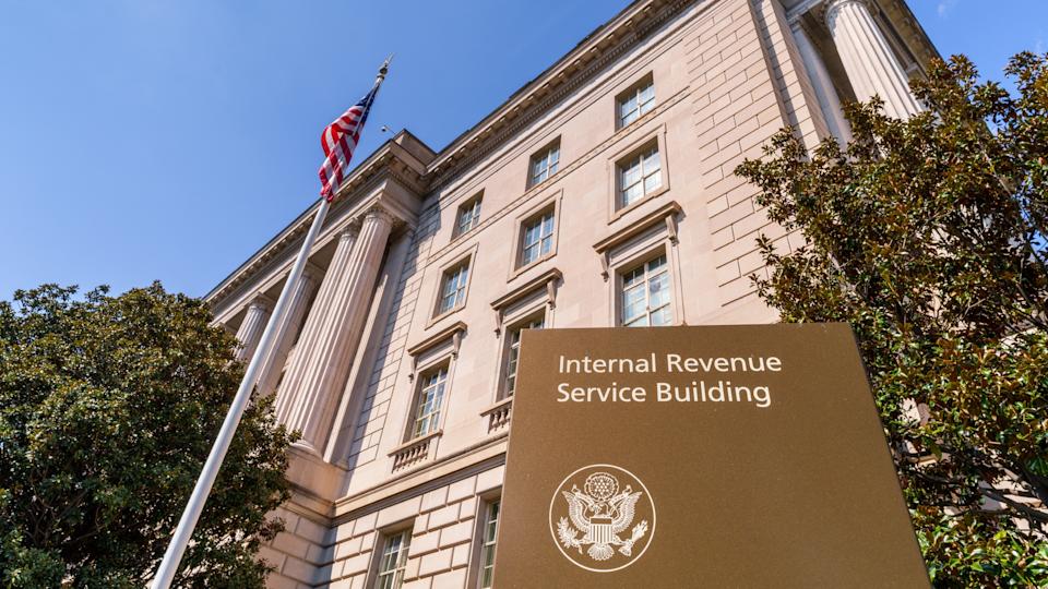 A sign marks the front of the U.S. Internal Revenue Service (IRS) headquarters building in Washington, DC.
