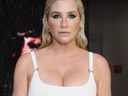 Kesha attends an art exhibition to celebrate the release of her album 