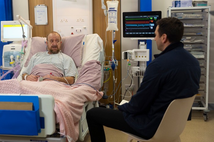 17_03_coro_mal_kit_02 Mal talks to Kit in the hospital in a scene from Coronation Street
