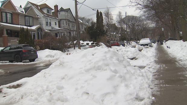 Snowbanks are still blocking parking on some streets more than a month after Toronto's last big storm