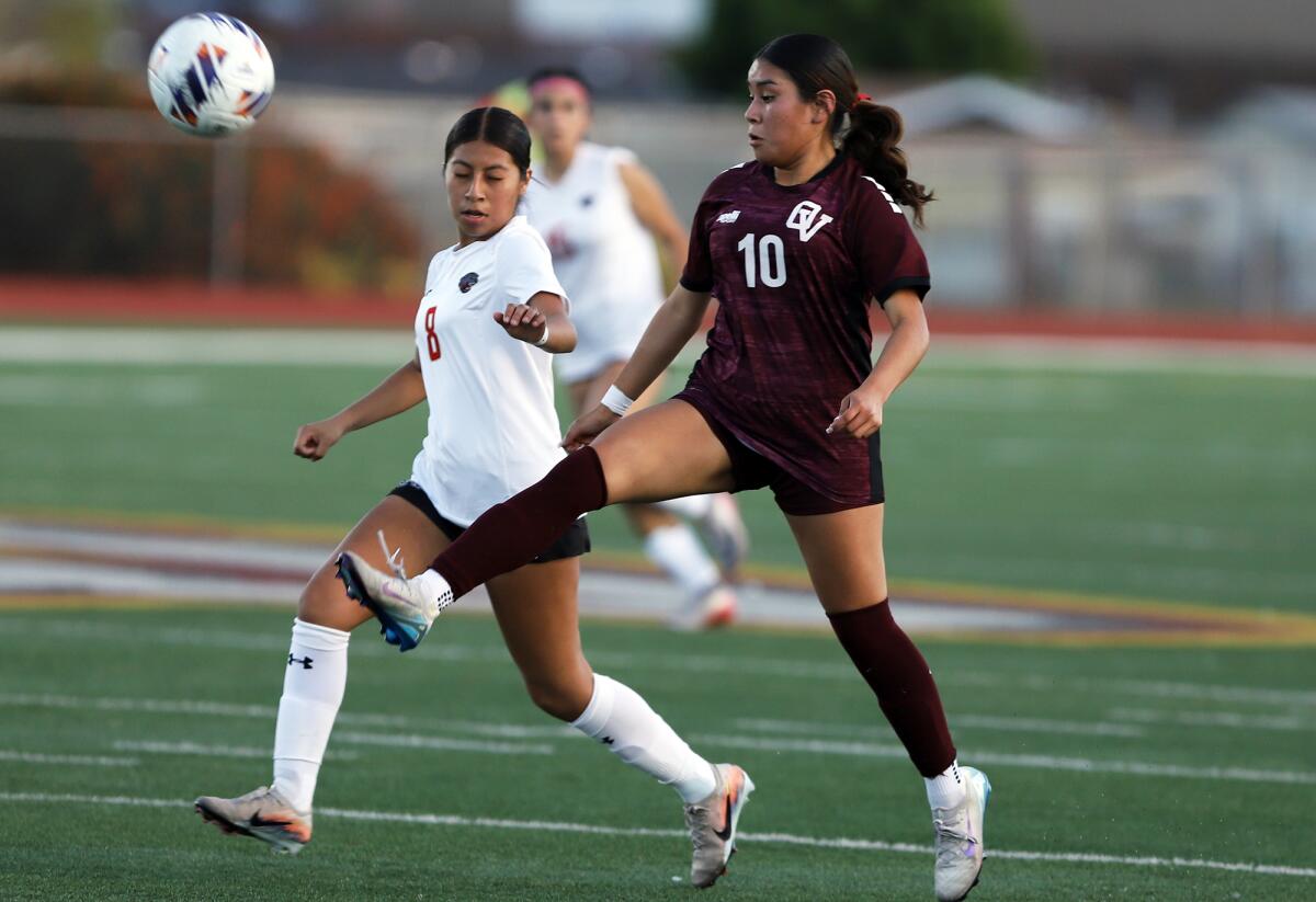 Ocean View's Yesenia Damien Gonzalez (10) plays defense against Segerstrom's Johanna Cruz (8) during Friday's match.