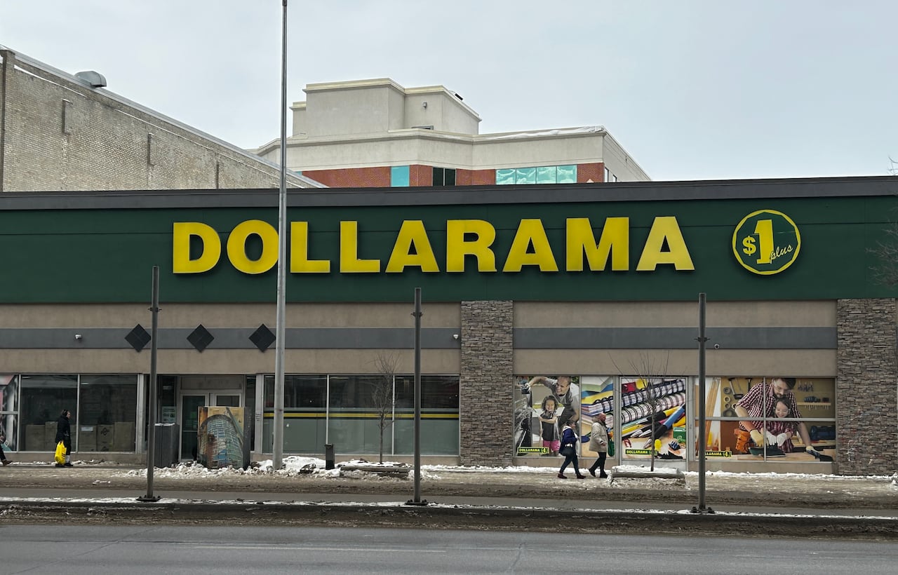 Exterior view of a store from the street. The sign says Dollarama.