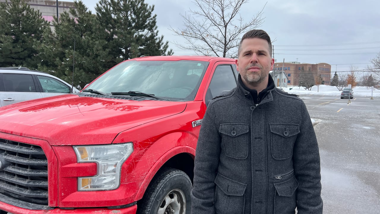 Ste-Marie is pictured with his truck last week.  '[I] would not go back to that place if ever it reopened,' he said of the parking garage at 170 Slater Street.